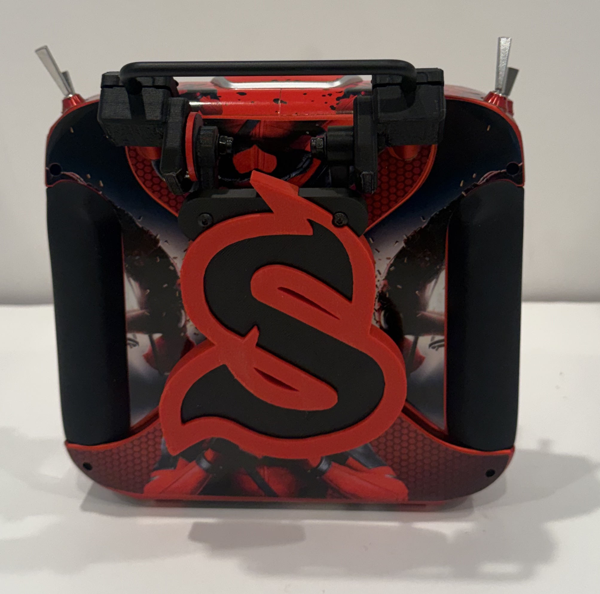 Spirit WAVE stand folded against the back of the transmitter
